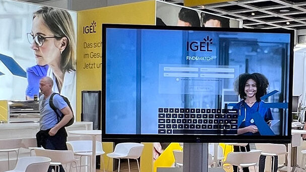 DEMEA Messestand von IGEL mit Messegame im Vordergrund