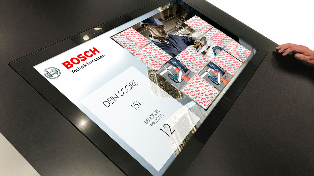 Bosch Slidepuzzle Messe-Gewinnspiel auf Touch-Monitor