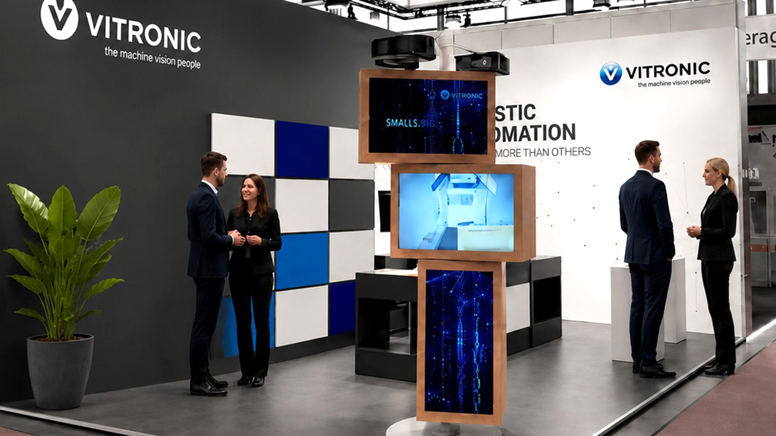 Kleiner Messestand von Vitronic in Systembauweise mit digitalem Eyecatcher mit integrierten Monitoren