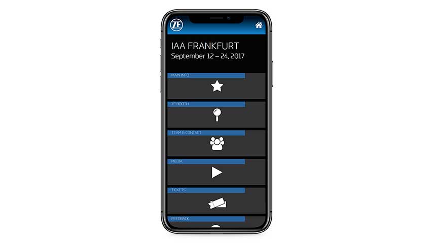 Smartphone mit Menüpunkten der Messe-App von ZF